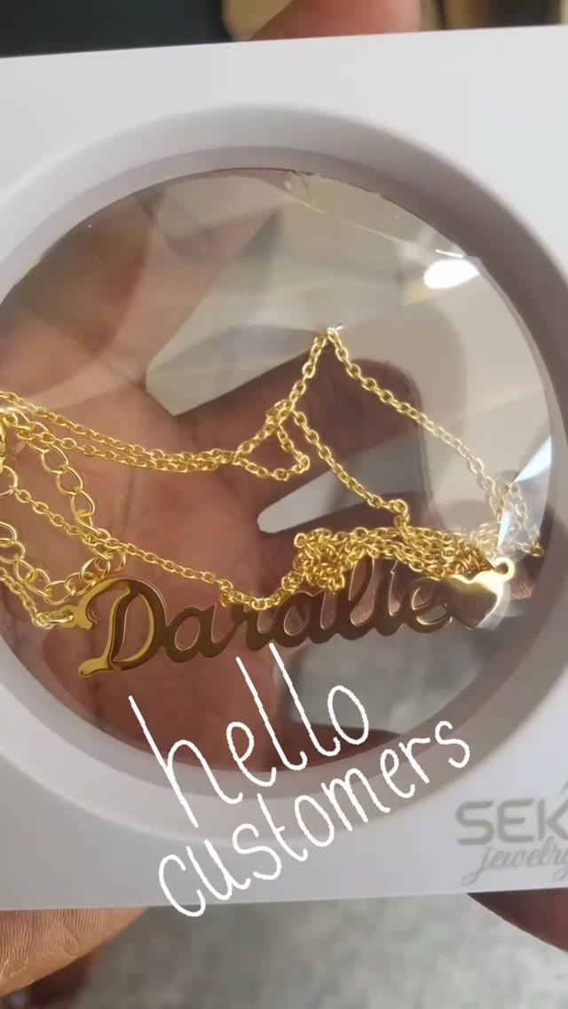 Gold script name necklace with heart clasp for a happy customer